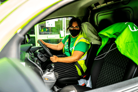 felix project volunteer driver at the wheel of a van