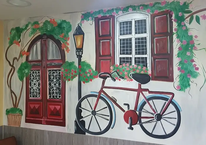 street with bicycle mural inside oakwood park cafe