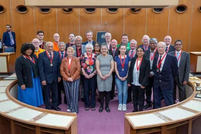 winners of lifetime awards from enfield council in the council chamber march 2024