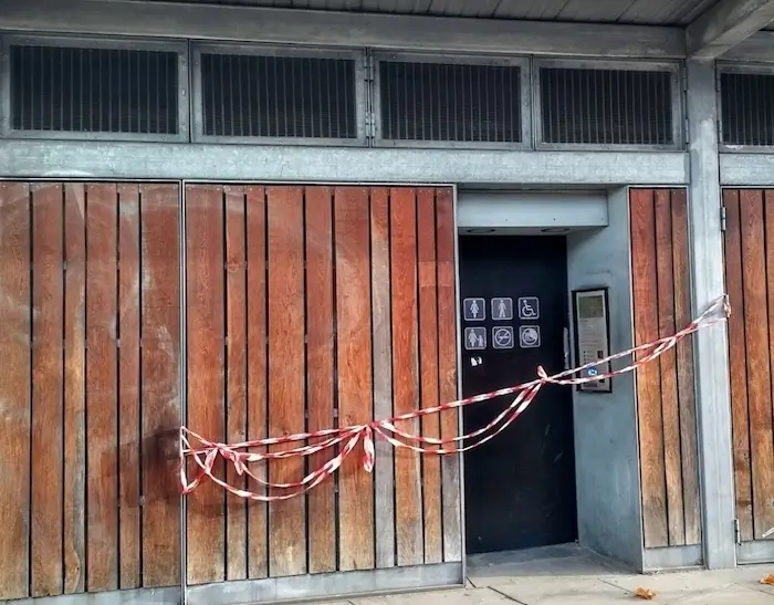 Closed public convenience with entrance taped off